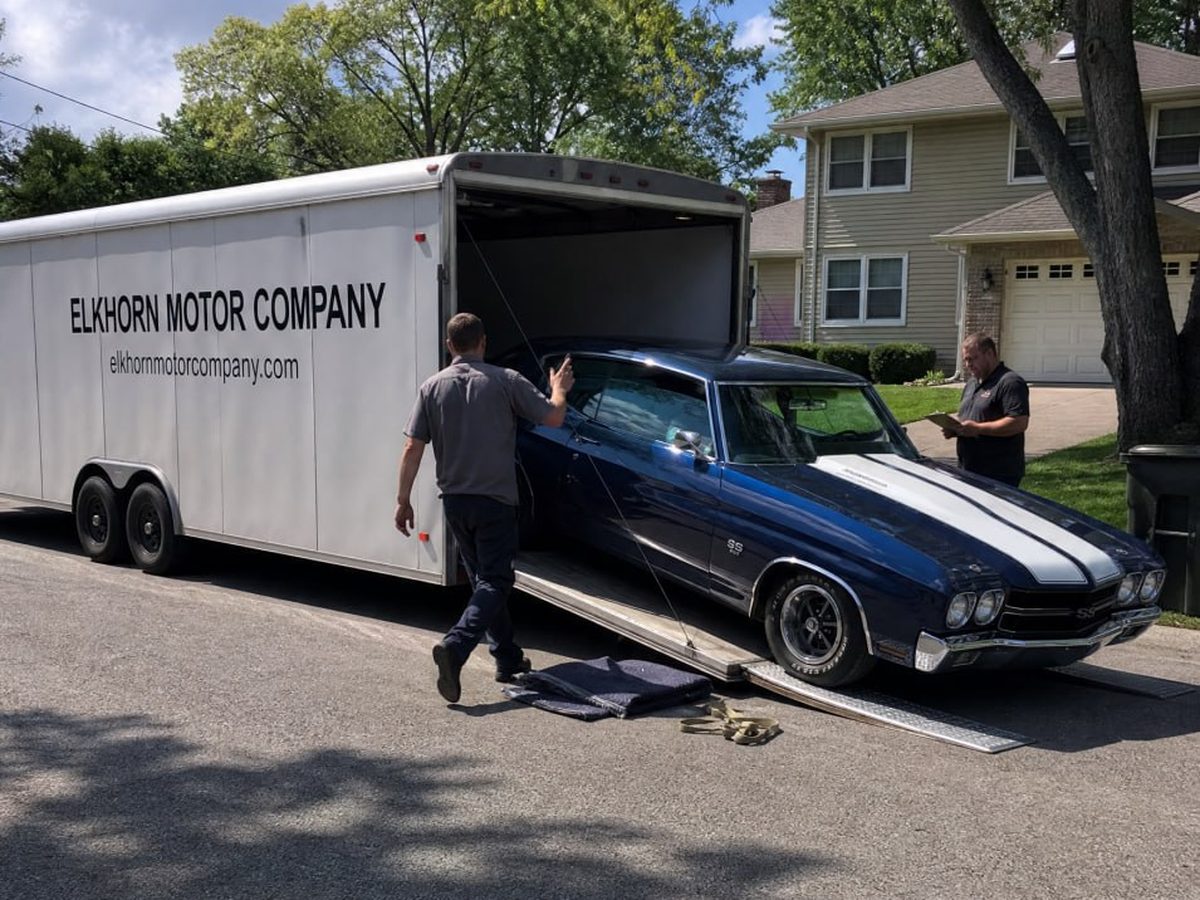 A Chevrolet Chevelle SS being unloaded from the Elkhorn trailer